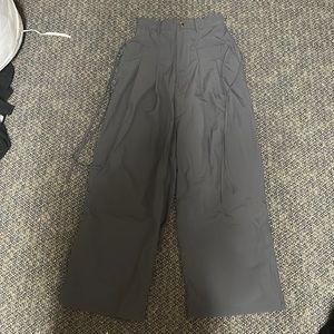 Gray parachute/cargo pants. Fashionable. Never been worn.